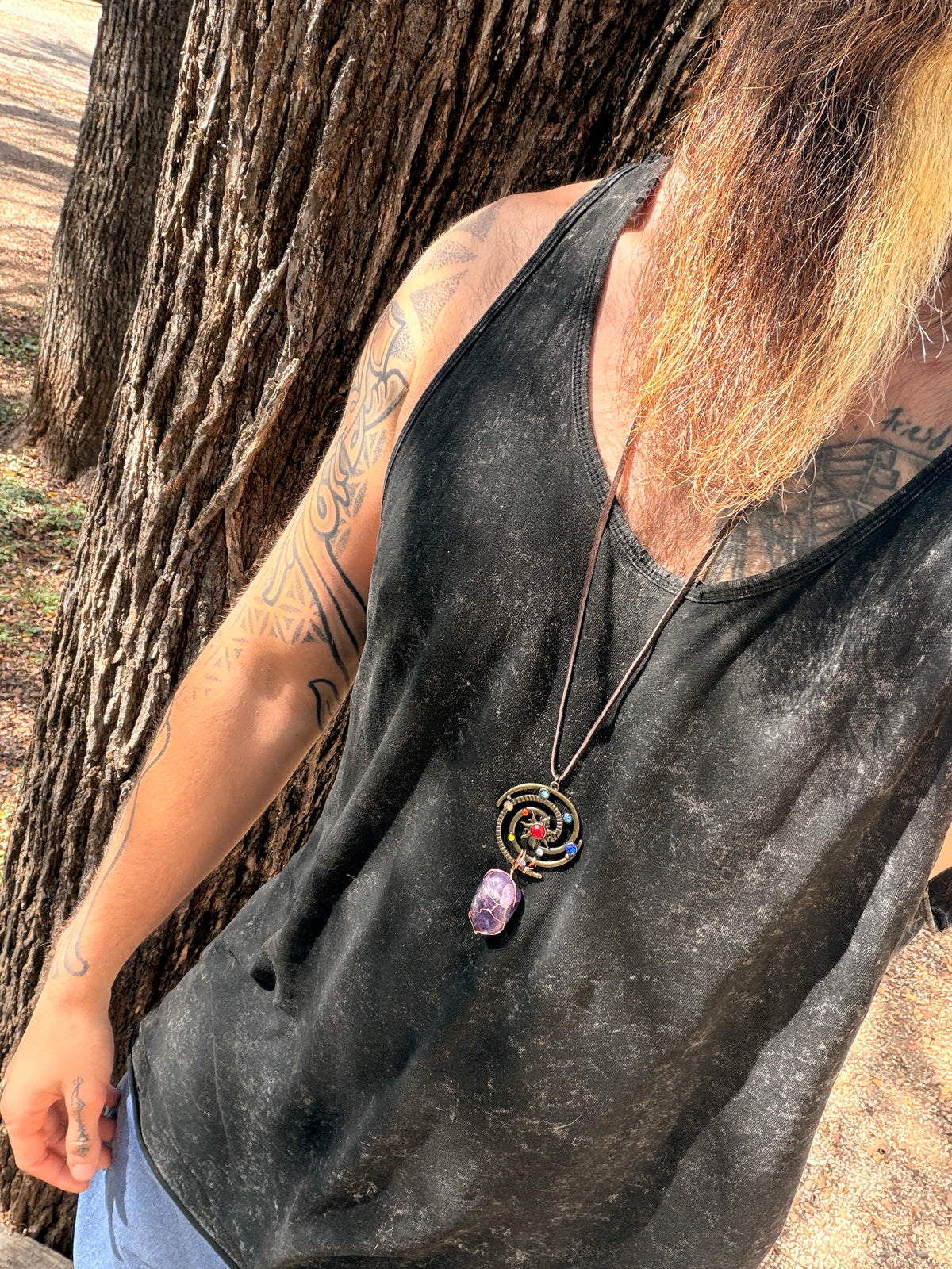 The Spiral Sun — Hand-Wrapped Amethyst Celestial Necklace