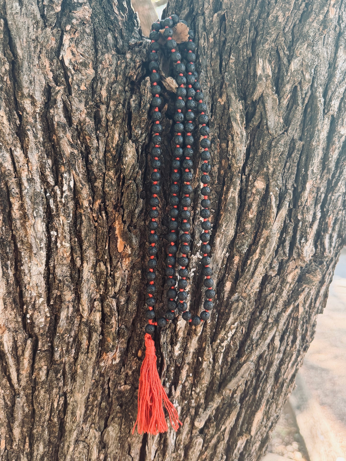 Lava Stone Mala Necklace with Red Tassel