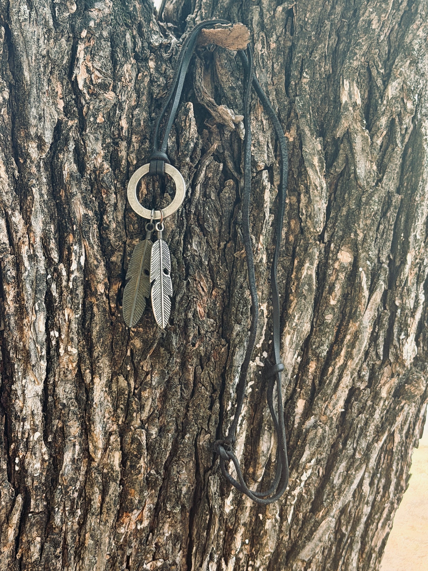 Antique Silver Feather Pendant on Leather Cord