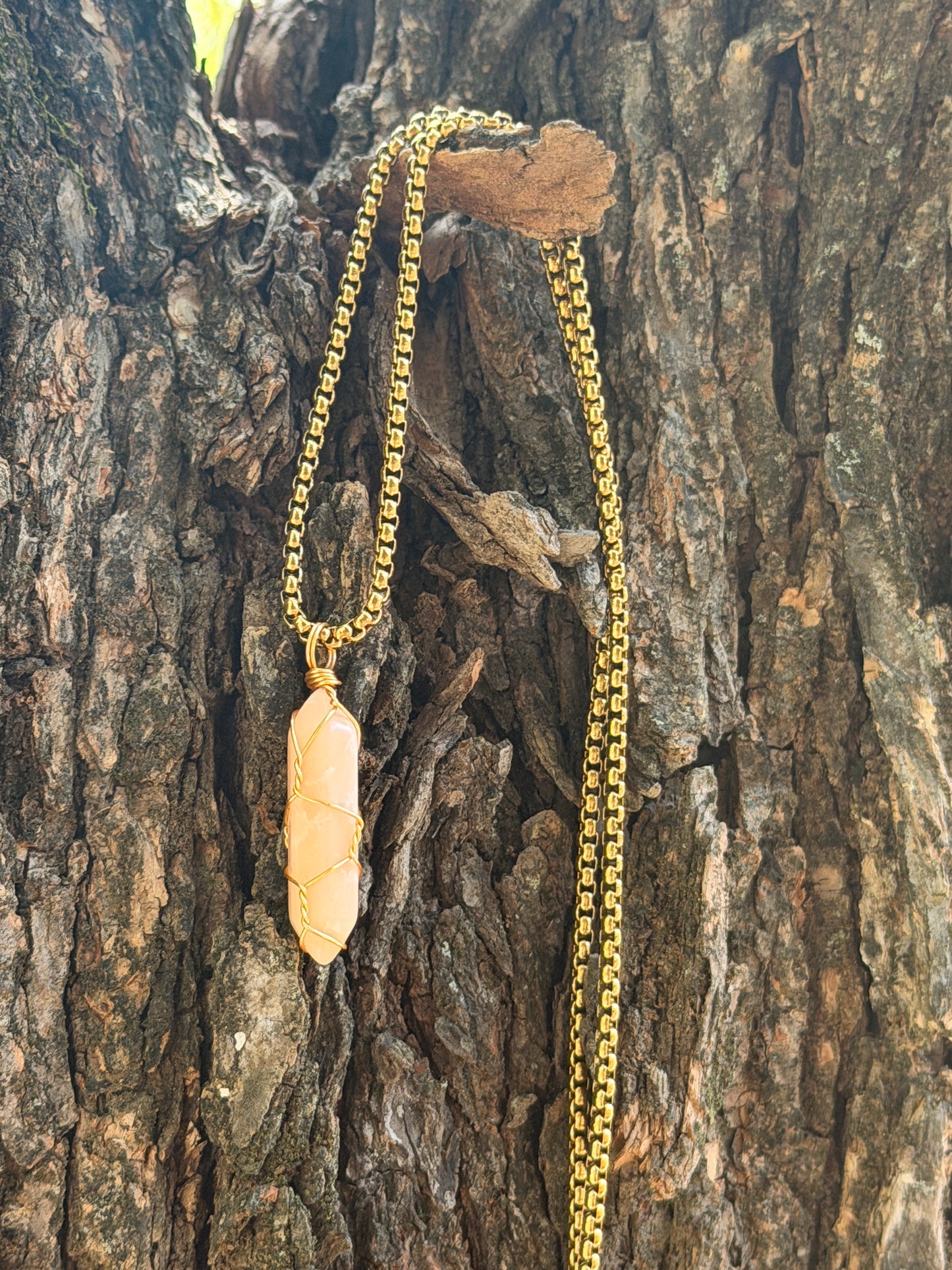 Peach Moonstone Point Pendant – Gold Wire Wrapped